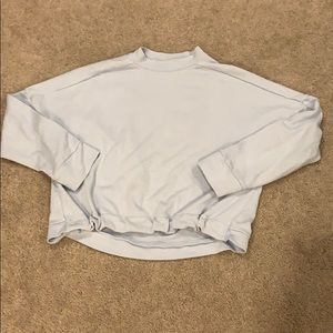 Fabletics blue terry Selena hi low crop sweatshirt